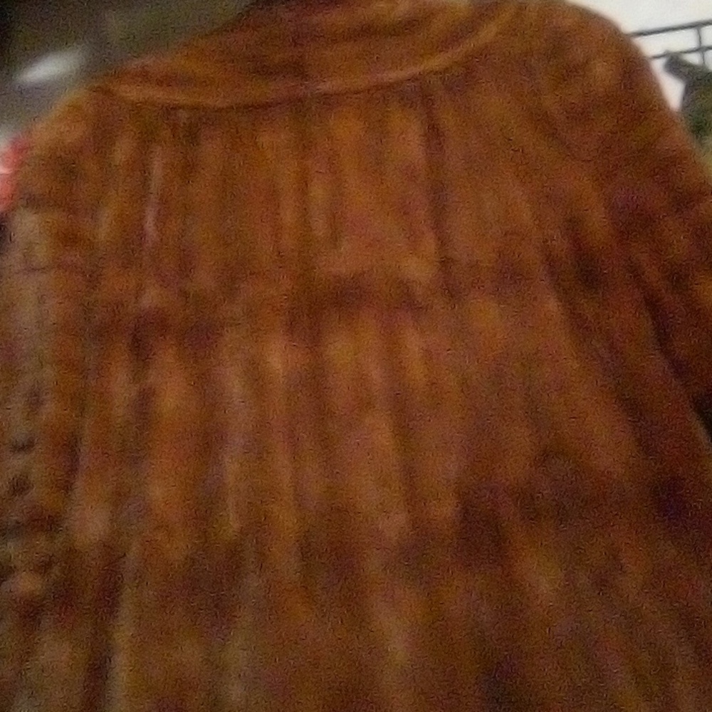 Mid length mink past the knee's beautiful mink jacket